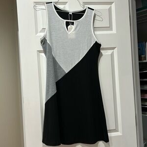 Never worn, A line dress with detail at the neck.  Perfect for summer